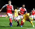 FA Cup: 100th goal for Walcott as Arsenal end Sutton's dream run