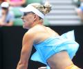 Kerber says top ranking weighs, but ready for grass season