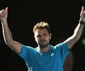 Wawrinka wins testy Tsonga clash to reach Aus Open semis