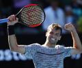 Dimitrov buries Goffin in baseline battle to book semis spot