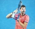 Dimitrov stuns Nishikori to end trophy drought with Brisbane title