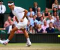 Federer subdues old-school Zverev to reach Wimbledon last 16