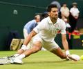 Novak Djokovic complains about delay and 'hole' on Centre Court