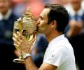 Federer wins record eighth Wimbledon title as Cilic crumbles