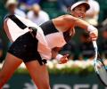 French Open PIX: Muguruza, Raonic, Thiem through to last 16; Dimitrov, Goffin out