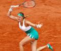 'Kiki' Mladenovic feeds off home crowd to advance in Paris