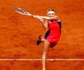 Bacsinszky knocks out French favourite Mladenovic in Paris