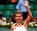 PHOTOS: Halep downs Pliskova to set up Ostapenko final