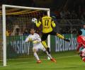 Aubameyang hat-trick leads Dortmund into last eight