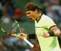 PHOTOS: Nadal wins in 1000th match, Raonic withdraws