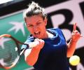 Halep, Muguruza through to Italian Open semis