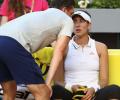 French Open champion Muguruza retires injured in Rome