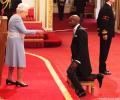 PIX: Four-time Olympic champion Mo Farah receives knighthood