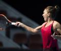 Tennis Roundup: Halep on top of the world, Nadal battles past Dimitrov