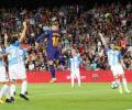 Barcelona, Valencia go clear at the top of La Liga