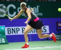 WTA Finals: Dominant Wozniacki swats aside Halep