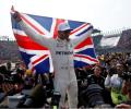 Hamilton collides but wins fourth title