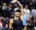 Sharapova back in business on and off court