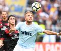 Football Briefs: Immobile hat-trick destroys Milan's perfect record