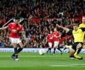 Rashford double helps Manchester United sink Burton