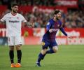 Soccer briefs: Messi to Barca's rescue; easy for Real Madrid