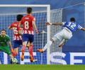 Football briefs: Barca sniff title after Atletico lose