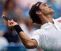 Federer wears down Wawrinka to maintain mastery over compatriot