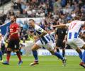 EPL PHOTOS: Manchester United STUNNED by Brighton