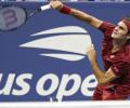 US Open PICS: Federer, Djokovic battle through in brutal heat