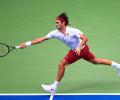 US Open PIX: Federer, Djokovic advance; Wozniacki crashes out