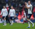 EPL PIX: Kane heads Tottenham to derby victory over Arsenal