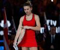 No escapes for brave Halep in third Grand Slam final