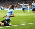 World Cup PIX: Brilliant Cavani brace earns Uruguay win over Portugal