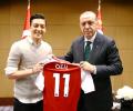 German soccer star Ozil defends photo with Erdogan