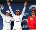 F1: Hamilton beats the elements to seize pole in wet Hungary