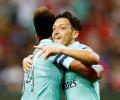 Ozil shines on return as Arsenal crush PSG in Singapore