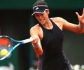 French Open PIX: Muguruza thrashes Sharapova, Halep powers past Kerber