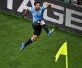 World Cup: Vintage Suarez on the spot as Uruguay go through