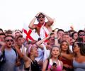 WC PIX: Subdued but still hopeful, England fans look beyond Belgium loss