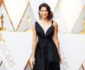 Che Bella! Wimbledon champ GarbIne Muguruza scorches red carpet at the Oscars!