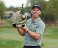 Sports Shorts: Casey wins Valspar as Woods finishes one stroke behind