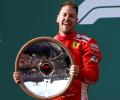 Australian GP: Opportunistic Vettel steals victory from Hamilton