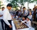 PICS: Anand, Karpov take on dozens of chess players in Jerusalem