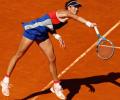 From red carpet to red dirt, Muguruza the warrior