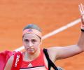 Flustered Champion Ostapenko falls at first French Open hurdle