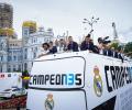 PHOTOS: Champions Real Madrid paint the town white during parade