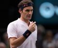 Federer begins road to 100 with a win in Paris