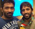 He quit wrestling to give India Olympic champion...