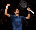 Djokovic outlasts Federer to set up Khachanov final