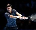 ATP Tour Finals: Djokovic tames Isner as Ronaldo watches